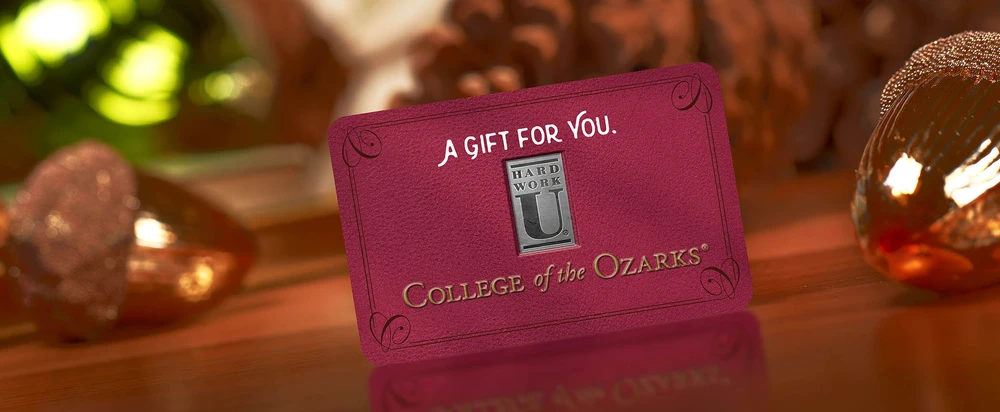 College of the Ozarks maroon gift card with “A Gift for You” text and Hard Work U logo.